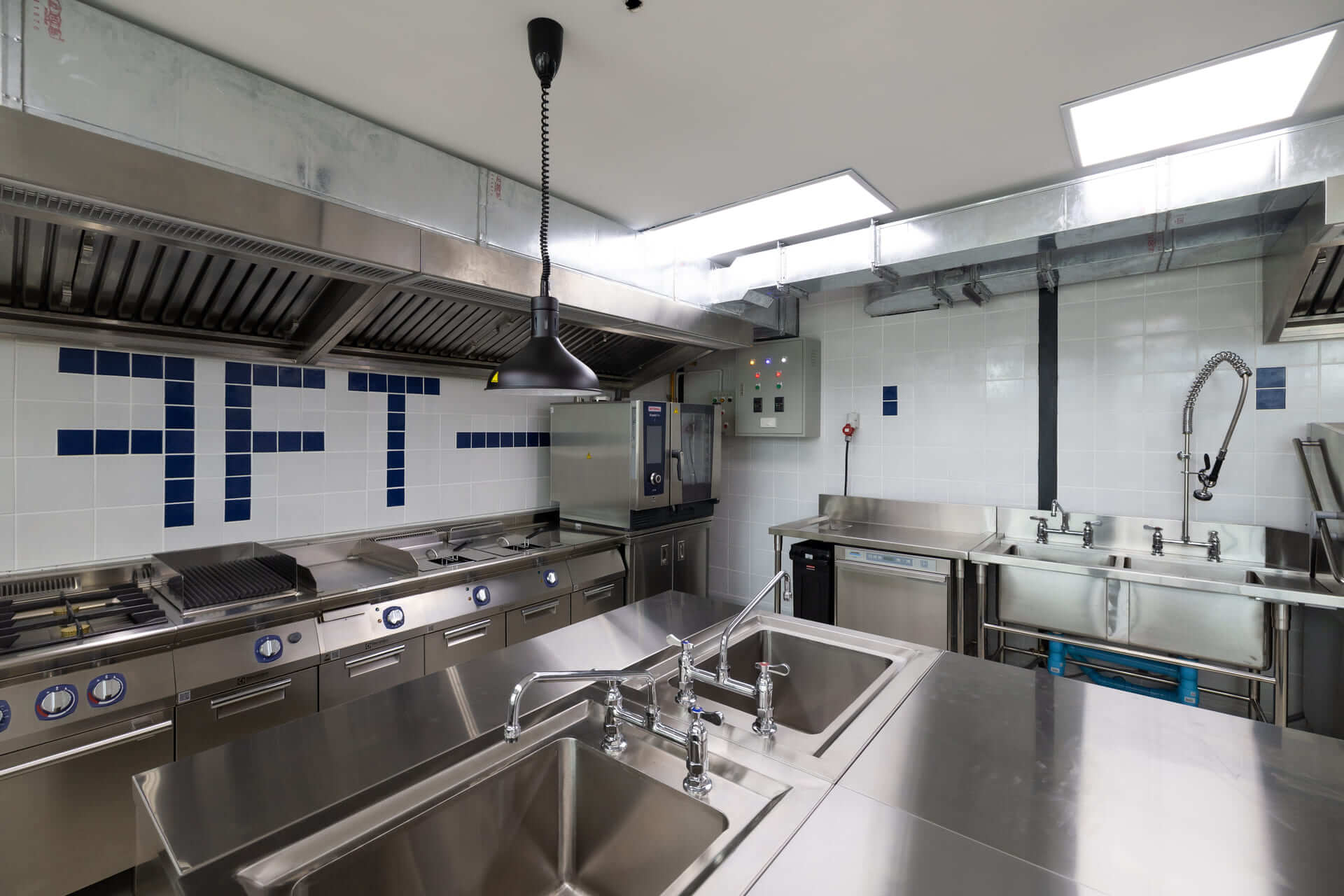 FFT Asia project team reviewing a commercial kitchen layout